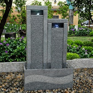 Height discrepancy artifical crystal granite stone water fountain in backyard