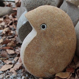 Estatuilla de talla de piedra de pájaro