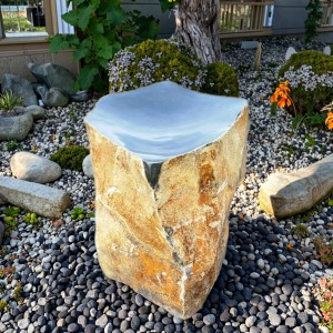 Polished basalt bowl fountain