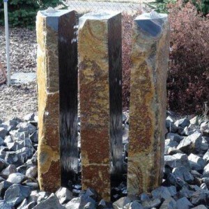 Triple basalt stone column fountains