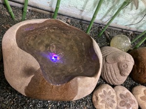 Cobble stone birdbath water fountain