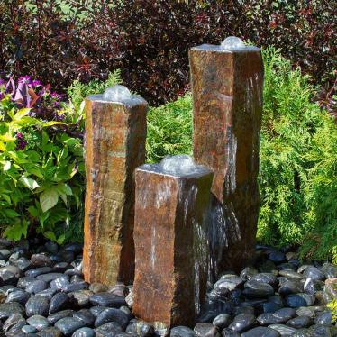 What to Put Around a Granite Water Feature