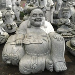Outdoor large laughing stone Buddha statues