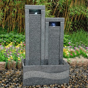 Height discrepancy artifical crystal granite stone water fountain in backyard