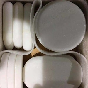 White marble hot facial stones for massage in box