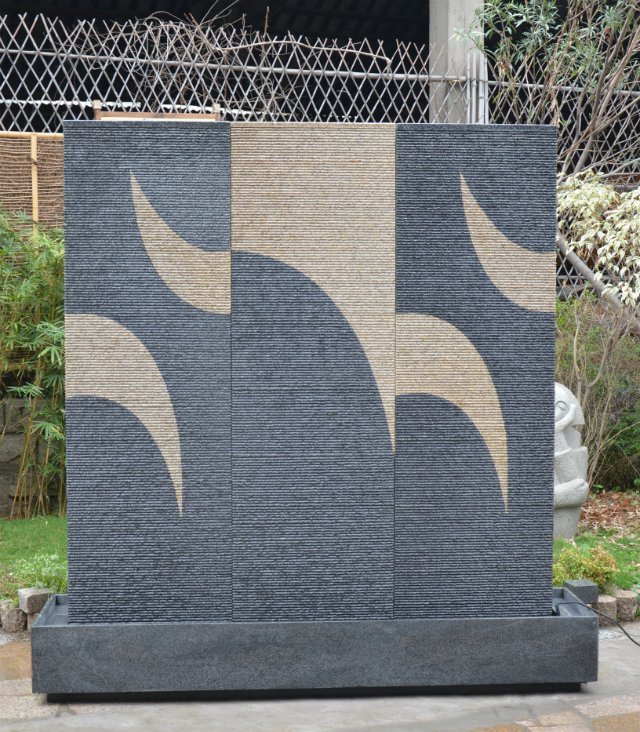 Natural Granite Water Feature Walls: Infusing Spaces with Textured Vitality and Timeless Charm