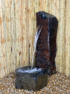 Natural basalt fountain with bowl