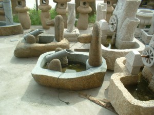 Cobble stone tiered water fountains