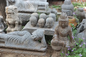 Granite sitting laughing Buddha statue