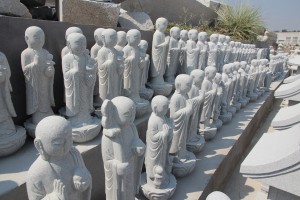 Granite sitting laughing Buddha statue