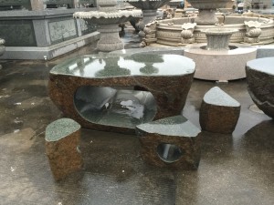 Curved granite bench for garden