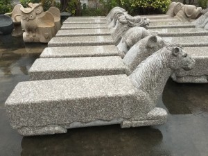 Granite table and curved chairs set outdoor for park