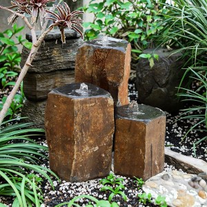 Triple basalt stone column fountains