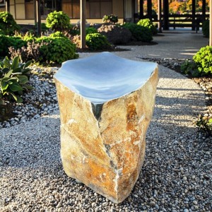 Polished basalt bowl fountain