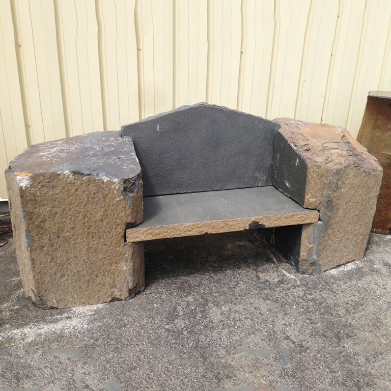 Antiqued basalt bench for garden decor Featured Image