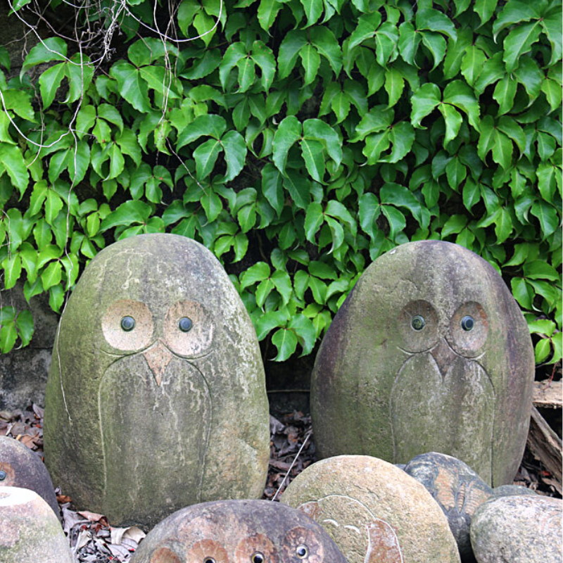big natural stone owl carving