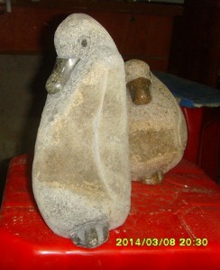 Boulder stone duck carving