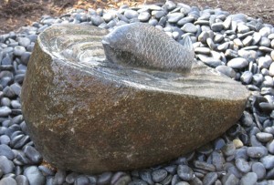 Boulder fish upstream fountain