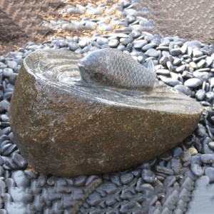 Boulder fish upstream fountain