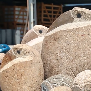 Large hand carved boulder pelican