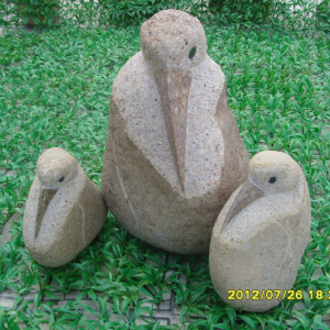 Natural stone pelican statue