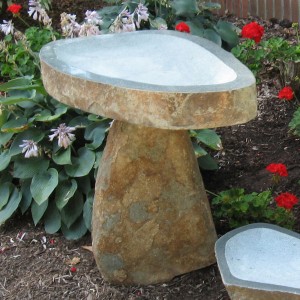 Basalt stone birdbath for garden decor