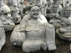 Granite sitting laughing Buddha statue