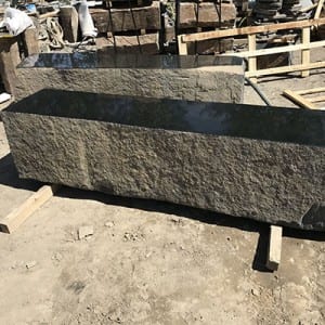 Polished surface basalt column bench