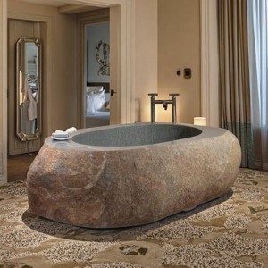 Irregular-Shaped Natural Stone Bathtub with Raw Texture for Rustic or Industrial Style Bathrooms
