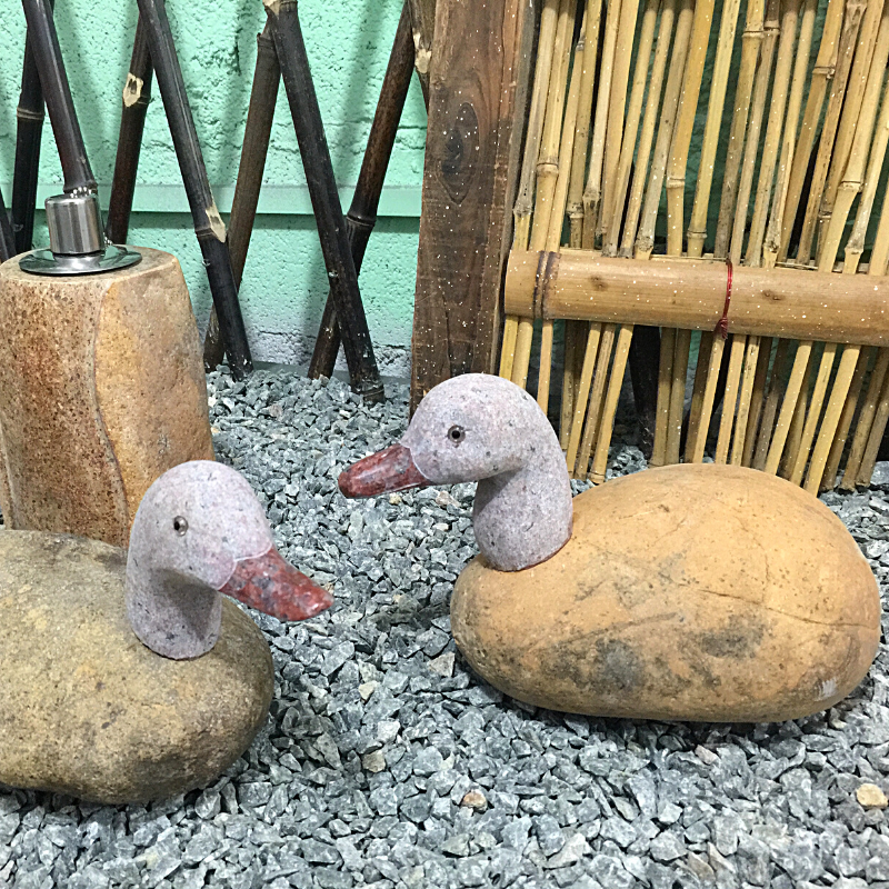 cobble rock duck sculpture