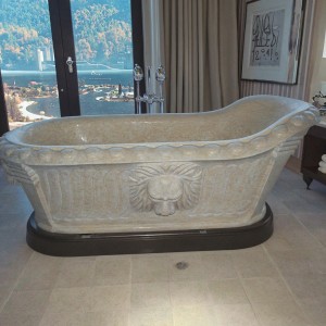 Sleek White Natural Stone Freestanding Bathtub with Minimalist Style for Contemporary Bathrooms