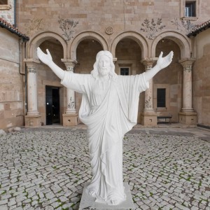 Serene White Marble Jesus Christ Statue – Durable Premium Stone Sculpture for Outdoor Worship Spaces
