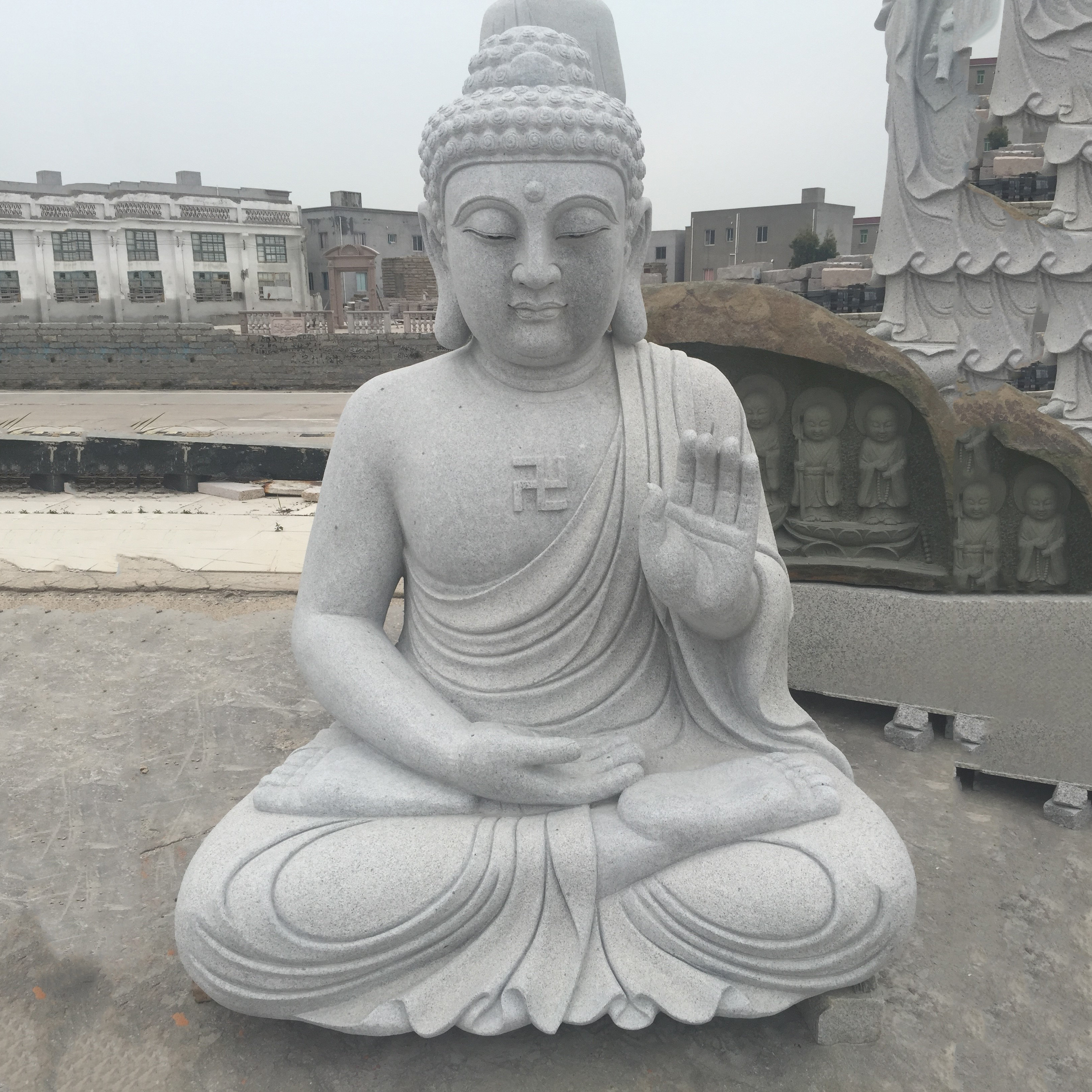 Large stone sitting Buddha garden statue Featured Image