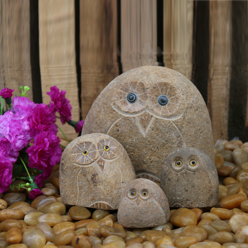 Natural cobble stone owl