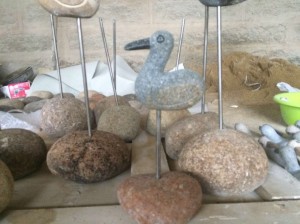 Hand crafted tall boulder pelican carving