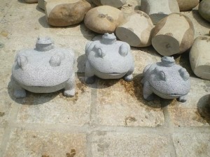 Carved stone frog decorative statue