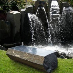 Polished surface basalt column bench