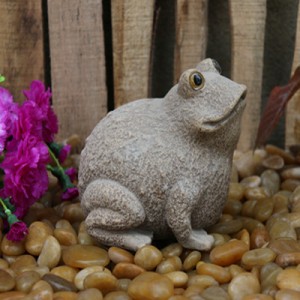 Carved stone frog decorative statue