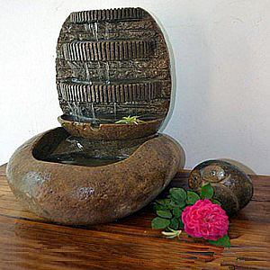 Indoor cobble stone water fountain